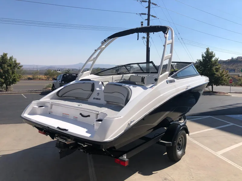 Slide: The Image of 2025 Yamaha Boats AR190 on trailer, sleek design, parked outdoors. - 9