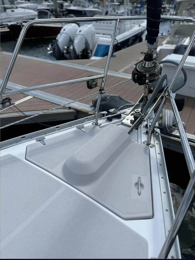Slide: The Image of 2013 Catalina 355 sailboat bow with stainless steel railing at marina. - 8