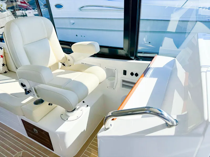 Slide: The Image of Luxurious helm seat in 2024 MJM 3 boat, featuring sleek design and modern controls. - 18