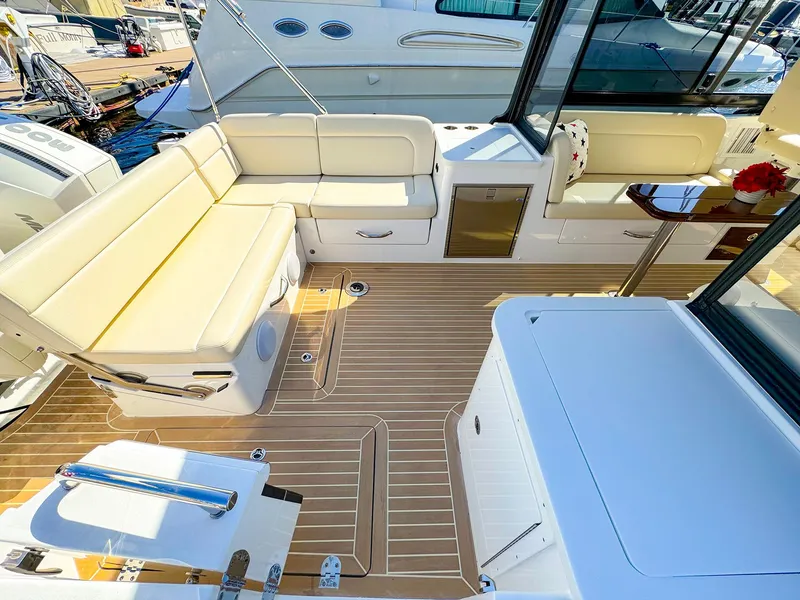 Slide: The Image of Luxurious 2024 MJM 3 yacht interior with elegant seating and teak flooring. - 27