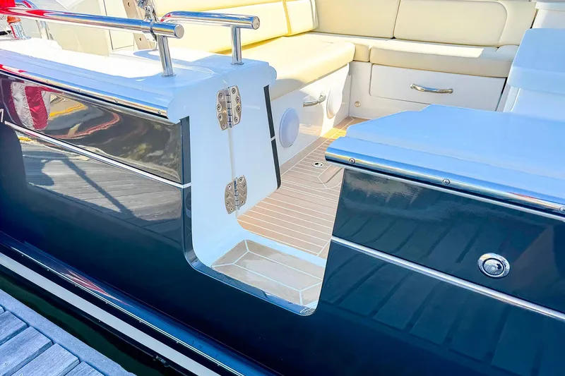 Slide: The Image of 2024 MJM 3 boat interior with sleek seating and polished finishes. - 3