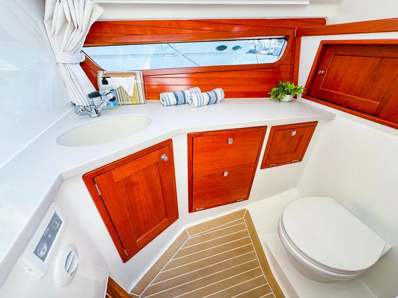 Slide: The Image of Luxurious 2024 MJM 3 yacht bathroom with wooden cabinets and modern fixtures. - 38