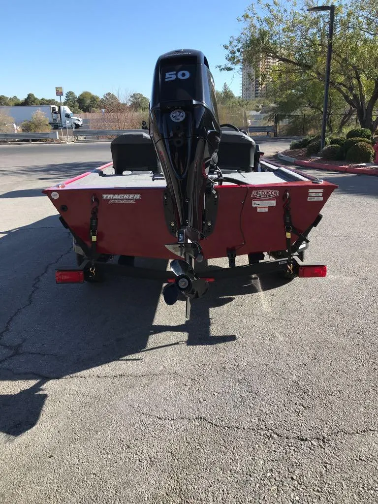 Slide: The Image of 2025 Tracker Bass Tracker Classic XL boat on trailer, parked outdoors. - 3