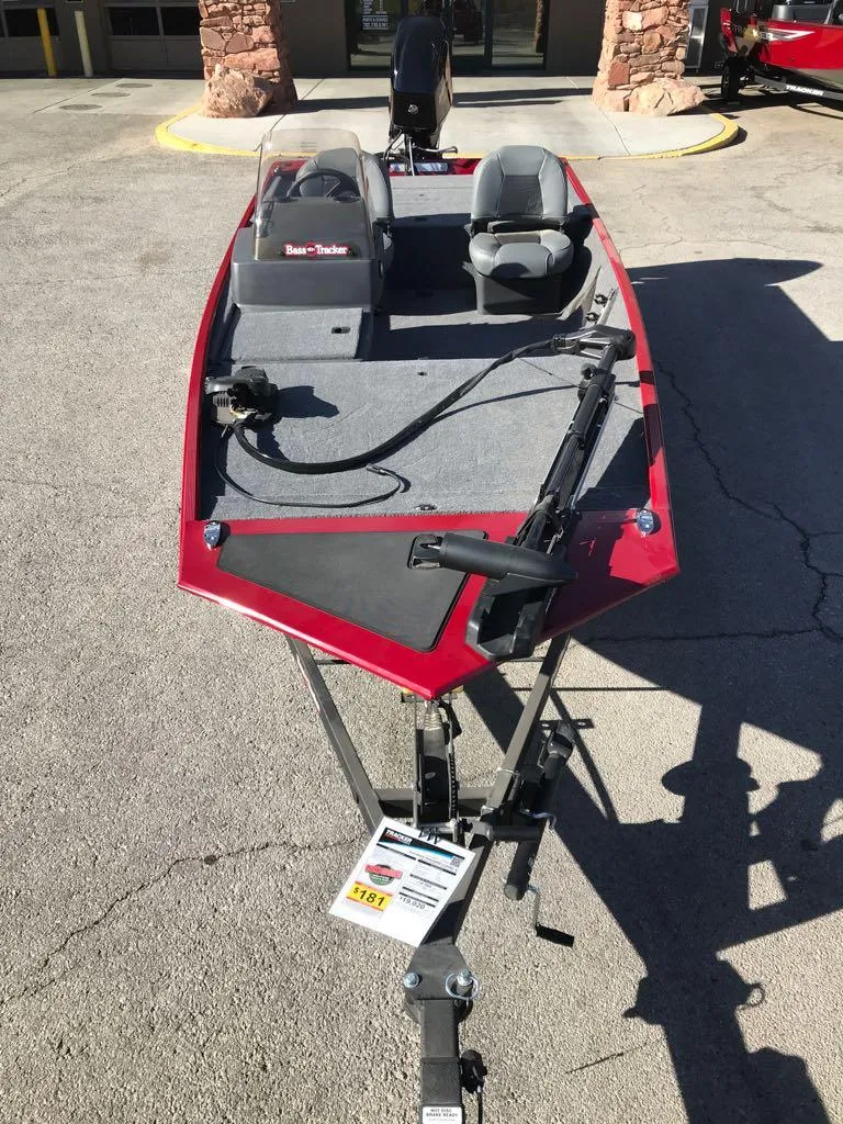 Slide: The Image of 2025 Tracker Bass Tracker Classic XL with Mercury 50 HP outboard motor in showroom. - 6