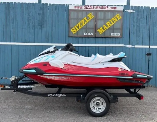 Slide: The Image of 2025 Yamaha WaveRunner VX Limited in red on trailer, Sizzle Marine dealership background. - 2