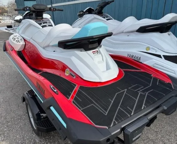 Slide: The Image of 2025 Yamaha WaveRunner VX Limited in red and white, parked outdoors. - 3