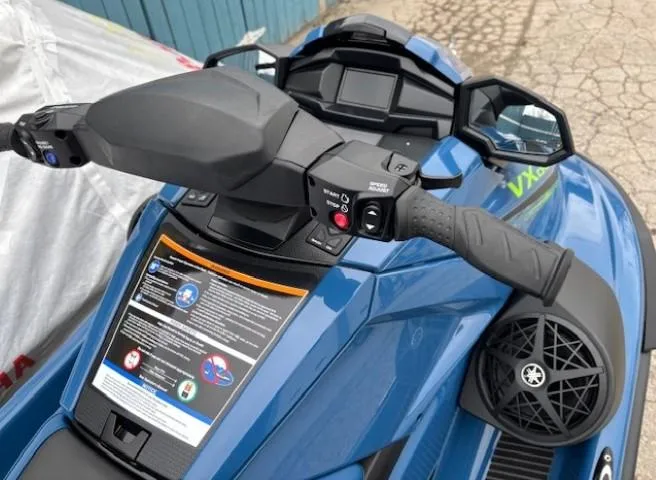 Slide: The Image of 2025 Yamaha WaveRunner VX Cruiser HO, blue, handlebar controls and dashboard display. - 4