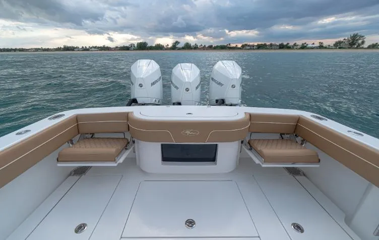 Slide: The Image of 2025 Valhalla Boatworks V 37 with triple engines on open water. - 4