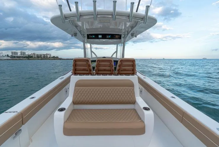 Slide: The Image of 2025 Valhalla Boatworks V 37 on open water, featuring luxurious seating and sleek design. - 5