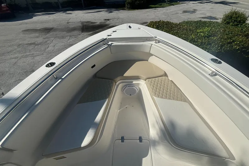 Slide: The Image of 2025 Bulls Bay 255CC boat interior, featuring spacious seating and sleek design. - 10