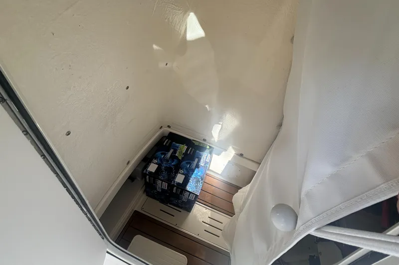 Slide: The Image of Interior cabin of 2025 Bulls Bay 255CC boat with storage area. - 12