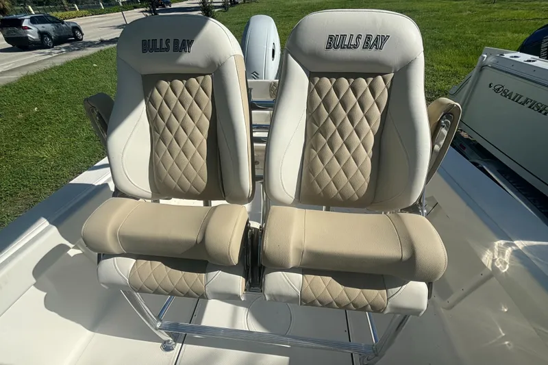 Slide: The Image of 2025 Bulls Bay 255CC boat seats with diamond-pattern upholstery. - 7