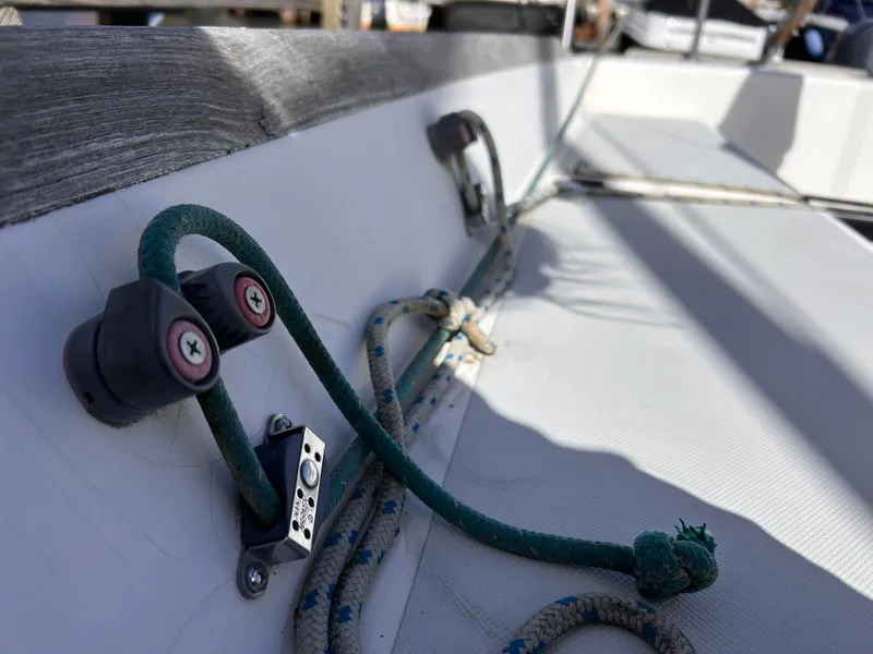 Slide: The Image of Close-up of 1991 J Boats J/22 sailboat deck with ropes and fittings. - 14