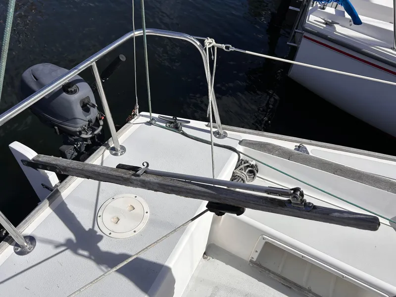 Slide: The Image of Sailboat deck of 1991 J Boats J/22 with motor and rigging. - 16