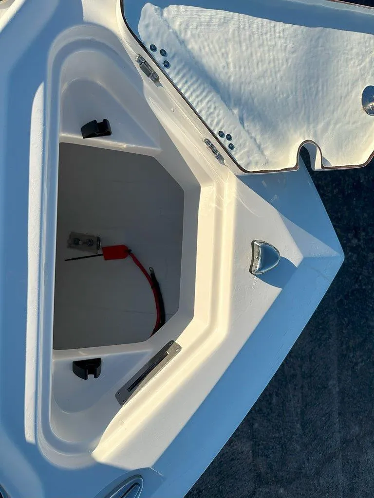 Slide: The Image of Sailfish 232 CC 2025 boat with Engel cooler under seat. - 13