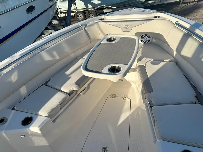 Slide: The Image of 2025 Sailfish 232 boat interior with steering wheel and control panel. - 16