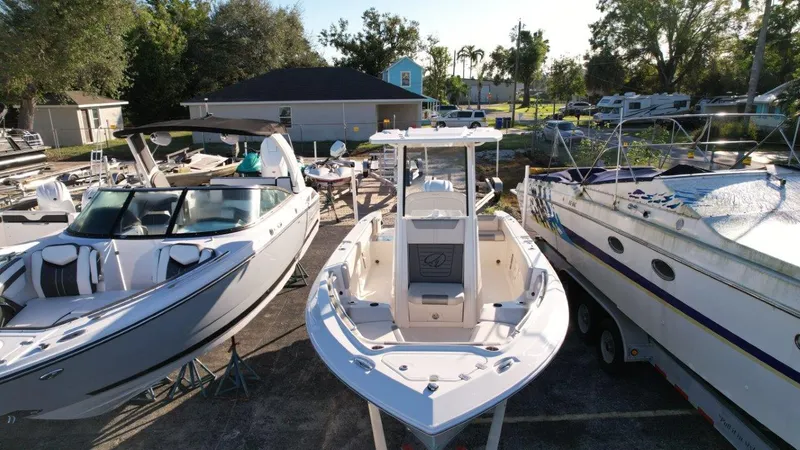 Slide: The Image of 2025 Sailfish 232 boat with Yamaha 300 V6 engine on trailer. - 7