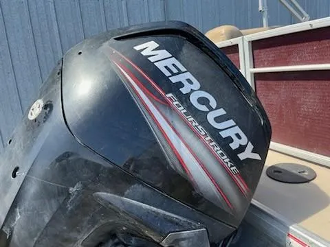 Slide: The Image of Mercury FourStroke engine on 2019 Sweetwater 2286SB boat. - 2