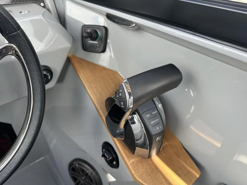 Slide: The Image of Boat throttle control in a 2021 Rand Leisure, featuring sleek design and modern controls. - 15
