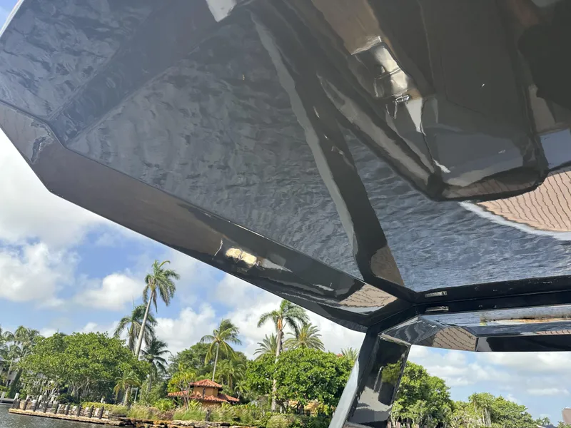 Slide: The Image of 2021 Rand Leisure boat canopy with tropical background and palm trees. - 20