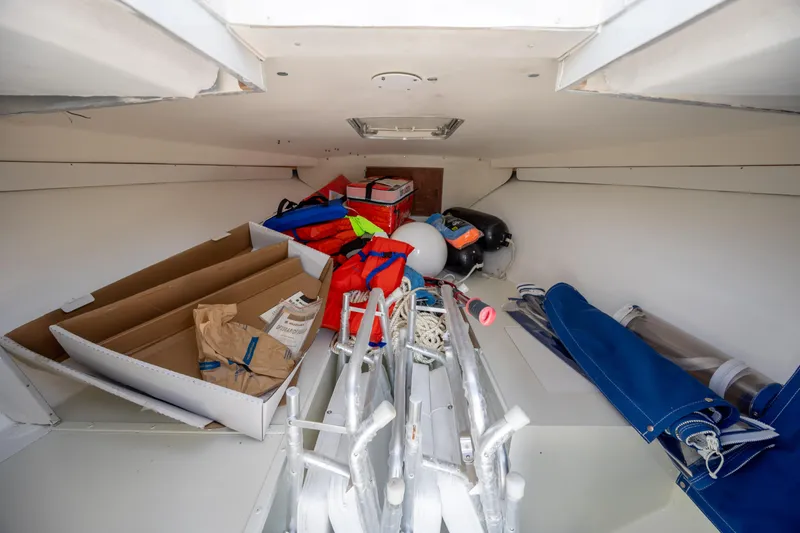 Slide: The Image of Interior storage of 1983 Bertram 28 Moppie boat with equipment and supplies. - 12