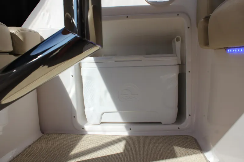 Slide: The Image of 2012 Regal 35 Sport Coupe interior storage with cooler compartment. - 10