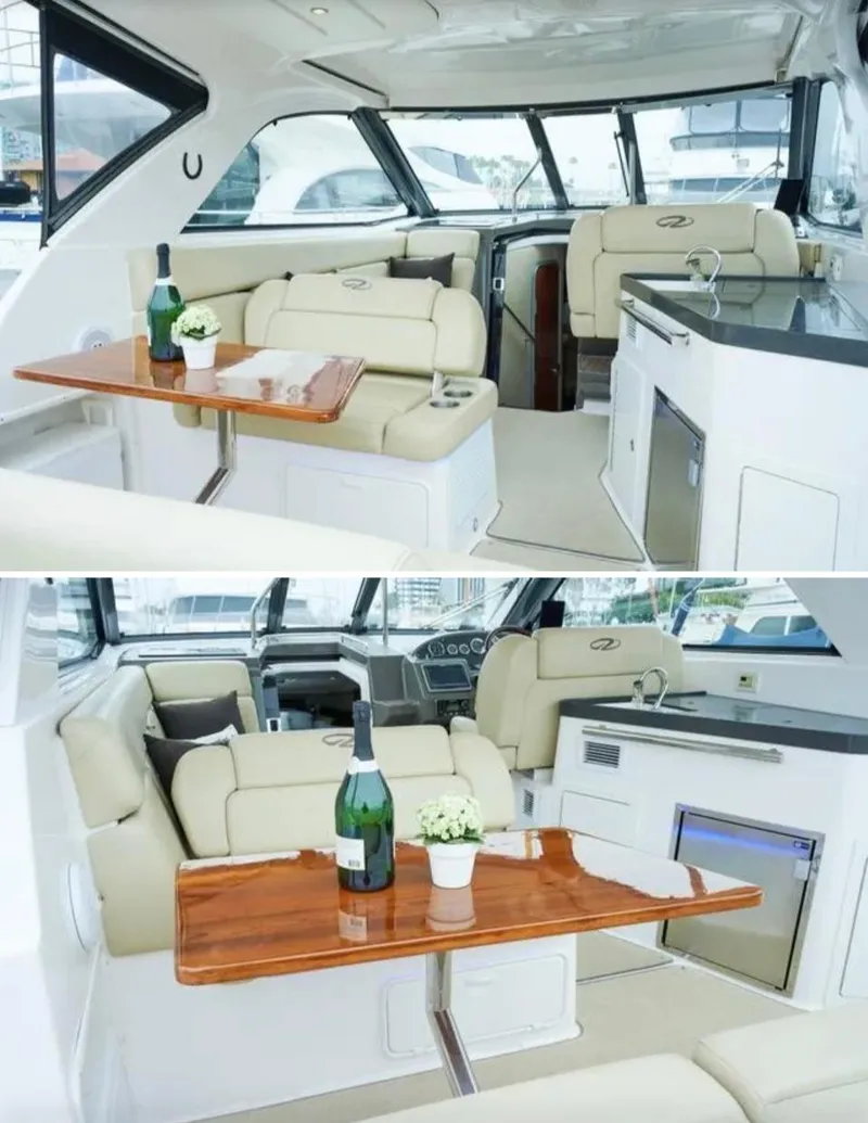 Slide: The Image of Luxurious interior of 2012 Regal 35 Sport Coupe with elegant seating and dining area. - 2