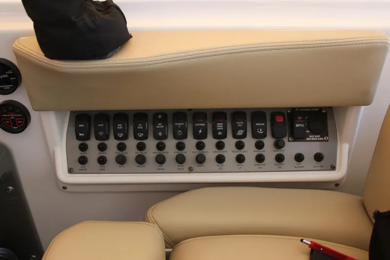 Slide: The Image of Control panel of 2012 Regal 35 Sport Coupe with beige seating. - 23