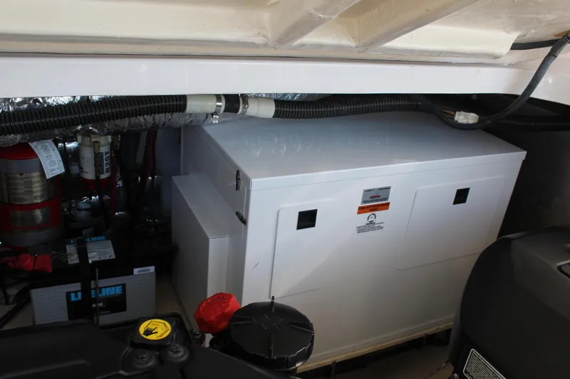 Slide: The Image of Engine compartment of 2012 Regal 35 Sport Coupe with generator and wiring. - 42