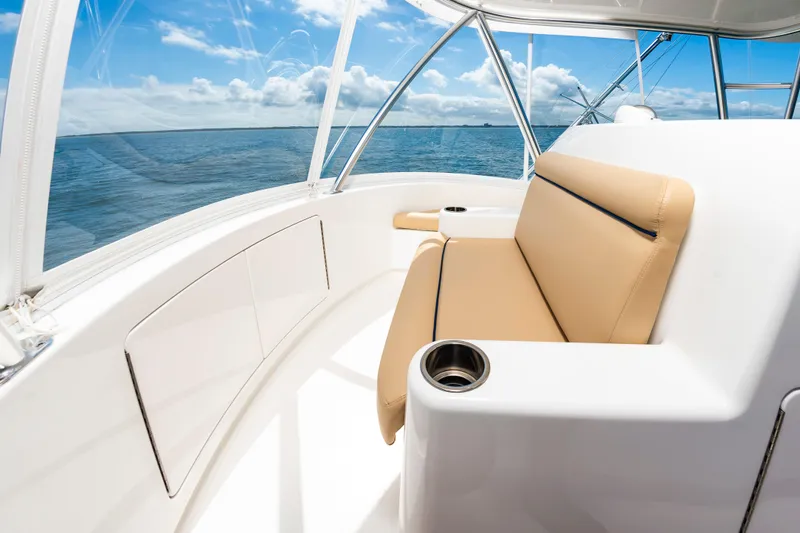 Slide: The Image of Luxurious seating on 2023 Viking 46 yacht with ocean view and clear skies. - 14