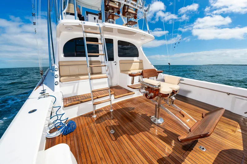 Slide: The Image of Luxurious 2023 Viking 46 yacht deck with seating and ocean view. - 19