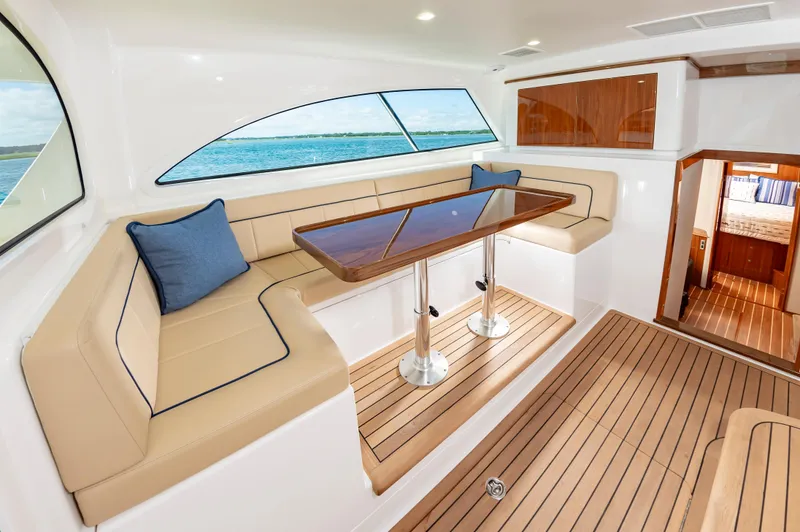 Slide: The Image of Luxurious interior of 2023 Viking 46 yacht with elegant seating and ocean view. - 24