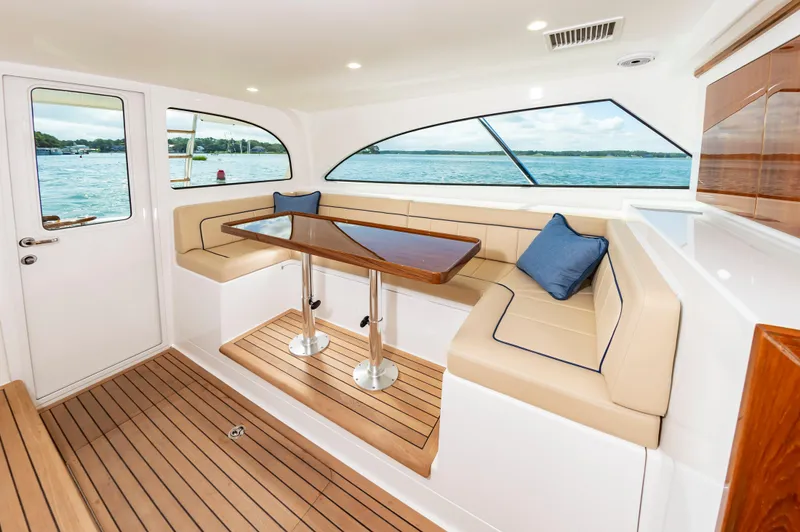 Slide: The Image of Luxurious interior of 2023 Viking 46 yacht with elegant seating and ocean view. - 25
