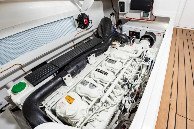 Slide: The Image of Engine room of 2023 Viking 46 yacht, showcasing advanced machinery and components. - 33