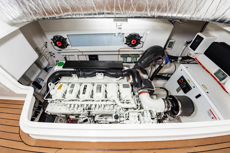 Slide: The Image of Engine room of 2023 Viking 46 yacht, showcasing advanced machinery and components. - 34