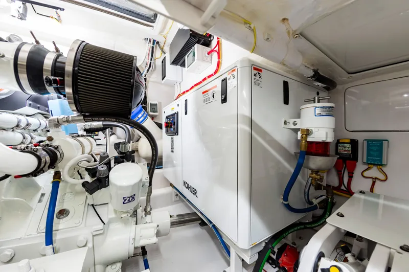 Slide: The Image of Engine room of 2023 Viking 46 yacht with Kohler generator and advanced machinery. - 39