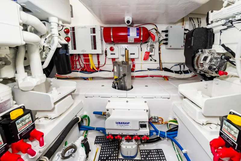 Slide: The Image of Engine room of 2023 Viking 46 yacht with advanced control systems and wiring. - 40