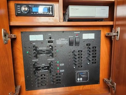 Slide: The Image of Control panel of a 2007 Rinker 300 Express Cruiser with audio system. - 10