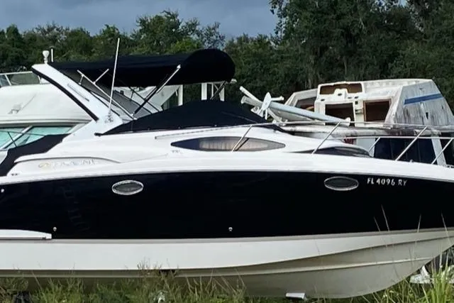 The Image of 2006 Regal 2860 Window Express boat docked outdoors. - 0