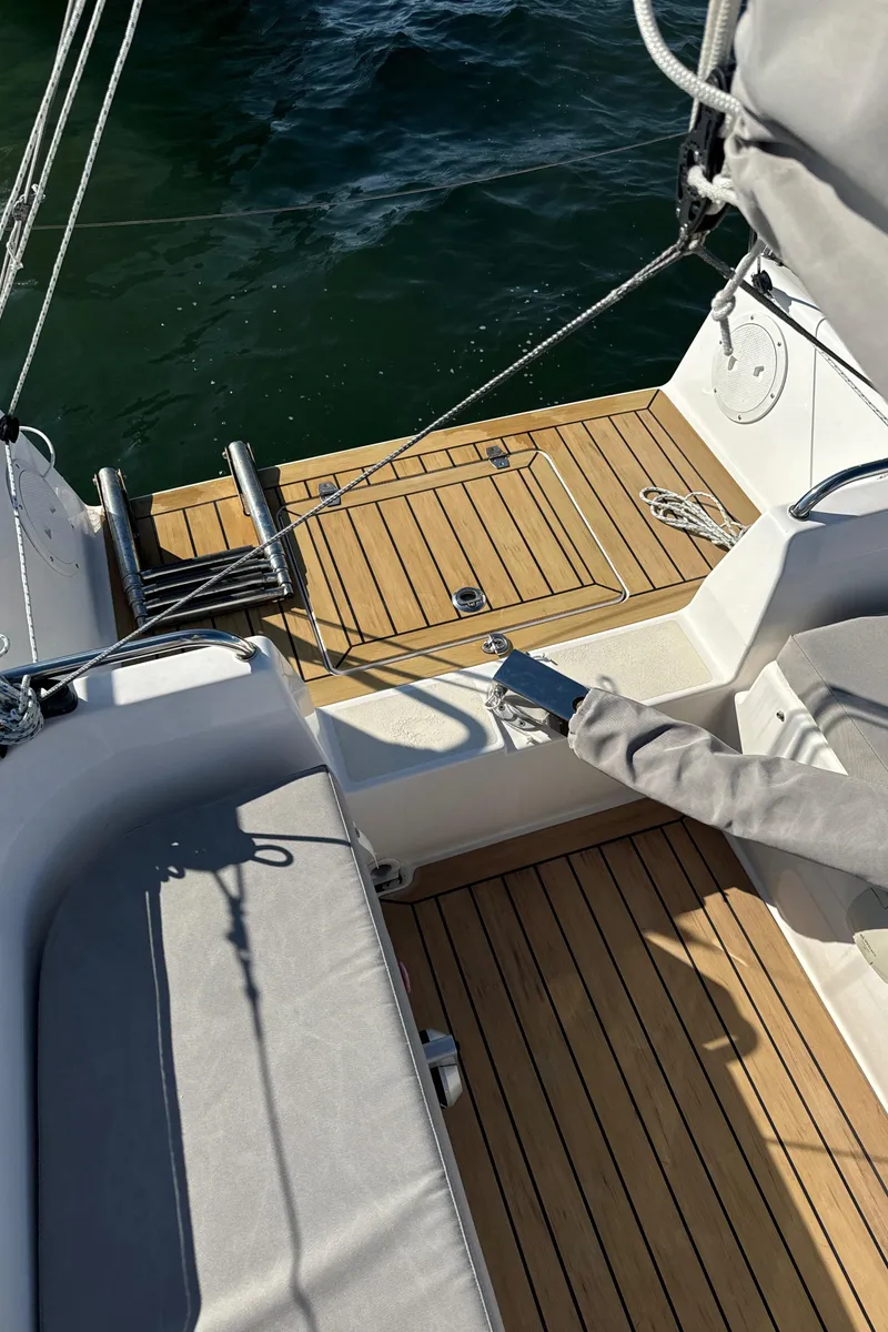 Slide: The Image of 2022 J Boats J/9 sailboat with teak deck and seating area. - 7