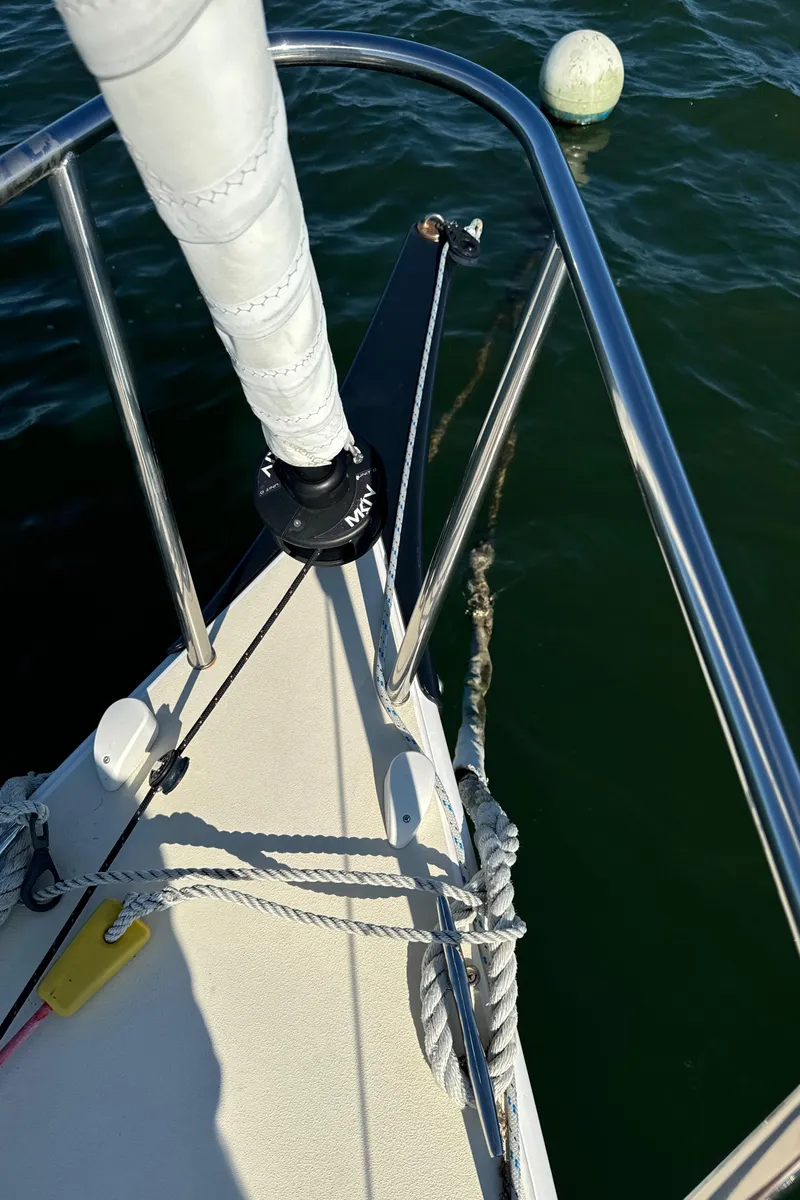 Slide: The Image of Bow of 2022 J Boats J/9 sailboat with mooring line and buoy. - 9