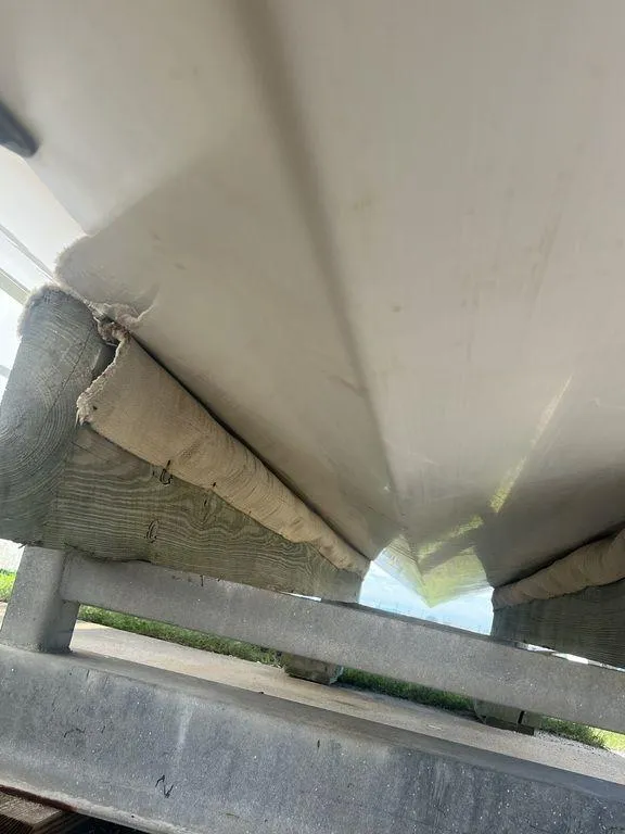 Slide: The Image of 2021 Regulator 41 boat hull on trailer, close-up view. - 11