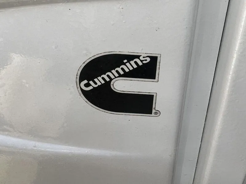 Slide: The Image of Cummins logo on 2021 Regulator 41 boat exterior. - 26