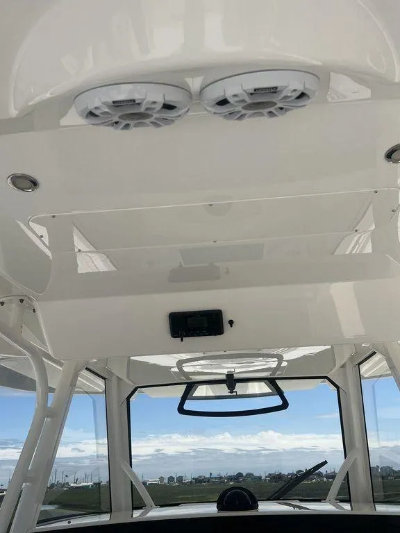 Slide: The Image of 2021 Regulator 41 boat interior with speakers and panoramic view. - 35