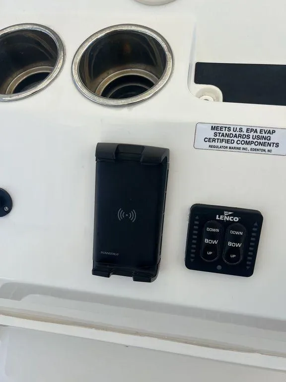 Slide: The Image of Control panel of 2021 Regulator 41 boat with Lenco trim tab switch. - 37