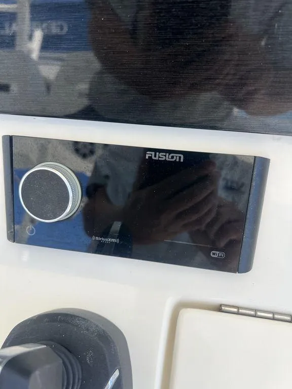 Slide: The Image of Fusion stereo system on 2021 Regulator 41 boat dashboard. - 38