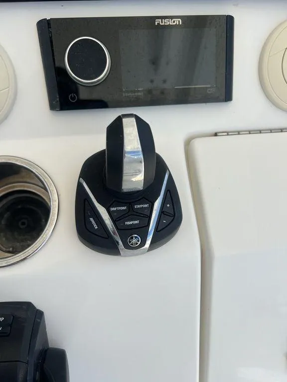 Slide: The Image of 2021 Regulator 41 boat control panel with Fusion audio system. - 39