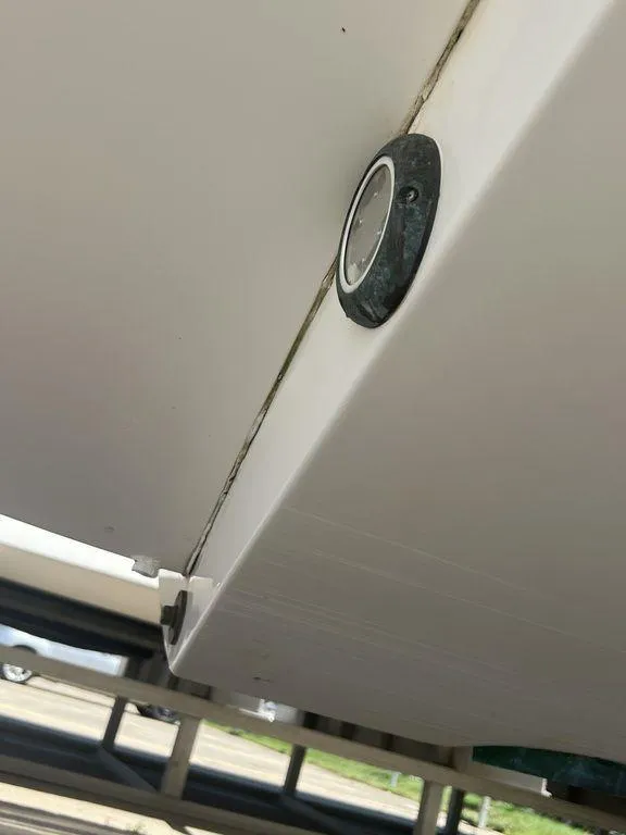 Slide: The Image of Close-up of 2021 Regulator 41 boat hull with underwater light. - 7