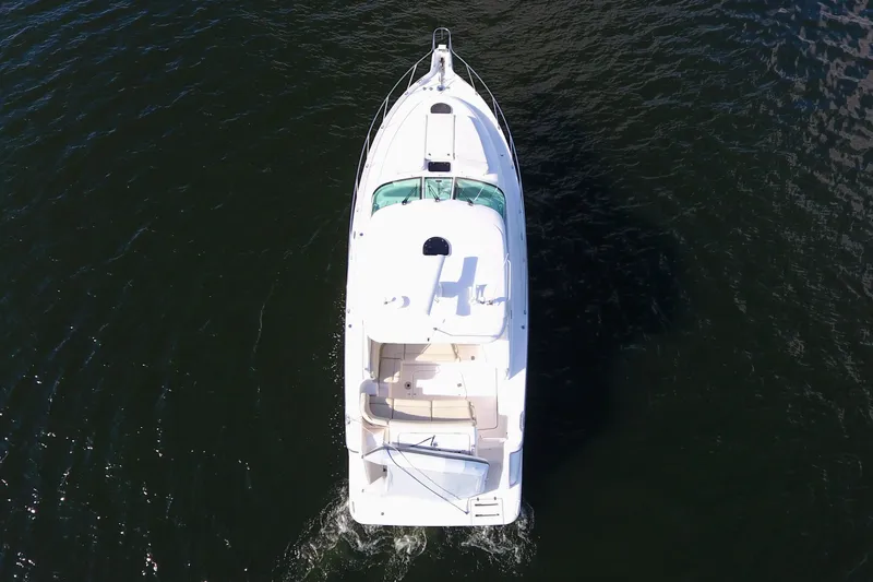 Slide: The Image of Aerial view of 2008 Tiara Yachts 3900 Sovran cruising on water. - 11