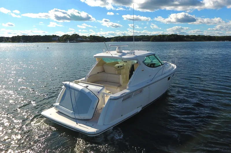 Slide: The Image of 2008 Tiara Yachts 3900 Sovran cruising on a sunny lake. - 4